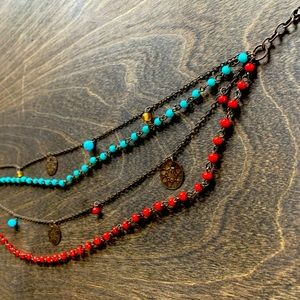 Layered brass and beaded necklace